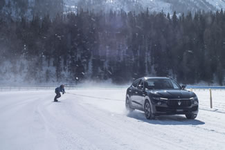 St Moritz, Switzerland -- Britain's fastest snowboarder Jamie Barrow has just broken the Guinness World Record for fastest speed on a snowboard towed by a vehicle; he reaches 151.57 km/h on a frozen lake at the Swiss alpine resort of St Moritz when towed behind the Ferrari-engined Maserati Levante S, thus setting the new world record for the fastest speed for a snowboard towed by a vehicle, according to the World Record Academy.